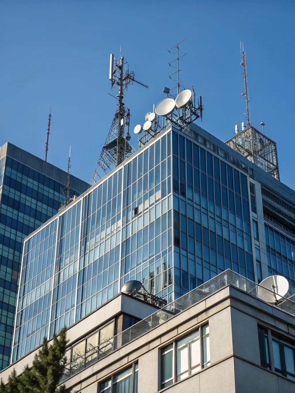A modern apartment building with visible fiber optic cables running into the building, showcasing the seamless integration of Xgen Networks' infrastructure.